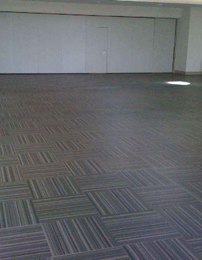 Open indoor space - patterend flooring. Trinity & All Saints Flooring done by Paynters Contract Flooring